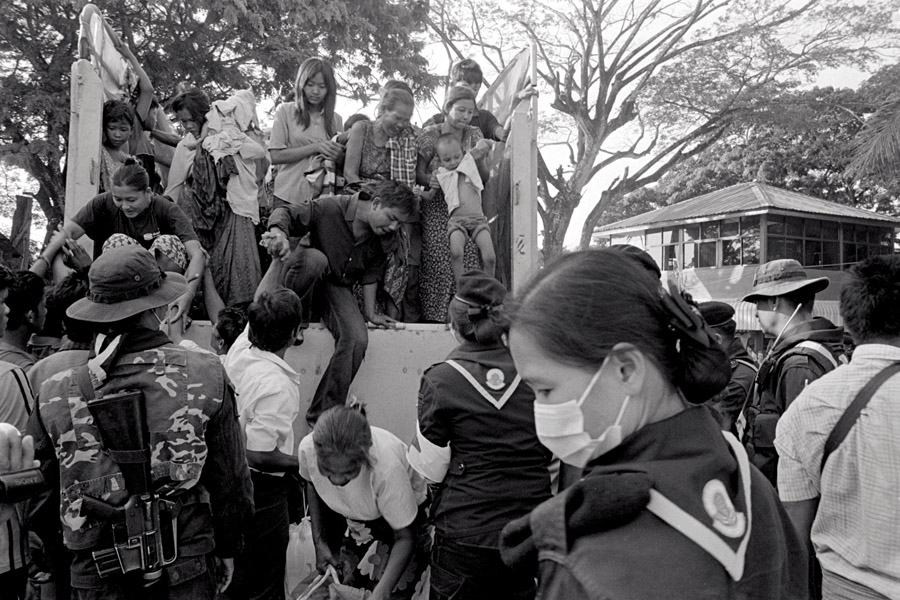 2010: On November 8th, the evening of the first democratic elections in Myanmar, fighting erupted in the villages near Myawaddy, and a bomb exploded in the border market on the Thai side of the river. Refugees poured in Thailand and were lodged at the army base on the highway. <br><br>They were officially sent back after 3 days to avoid government conflict. Not everyone felt safe to return and hid in Mae Sot. Those who returned were helped by various NGOs like Help Without Frontiers, who arranged transportation and provided food (in addition to support from the Thai army).