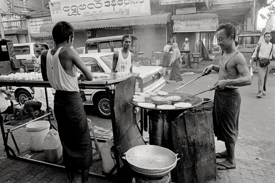 Yangon 2009: street vendor frying chapati.