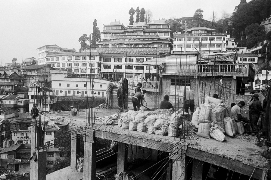 Darjeeling, India 2015: View of Dali Gompa from a construction site, in a town built on hills.