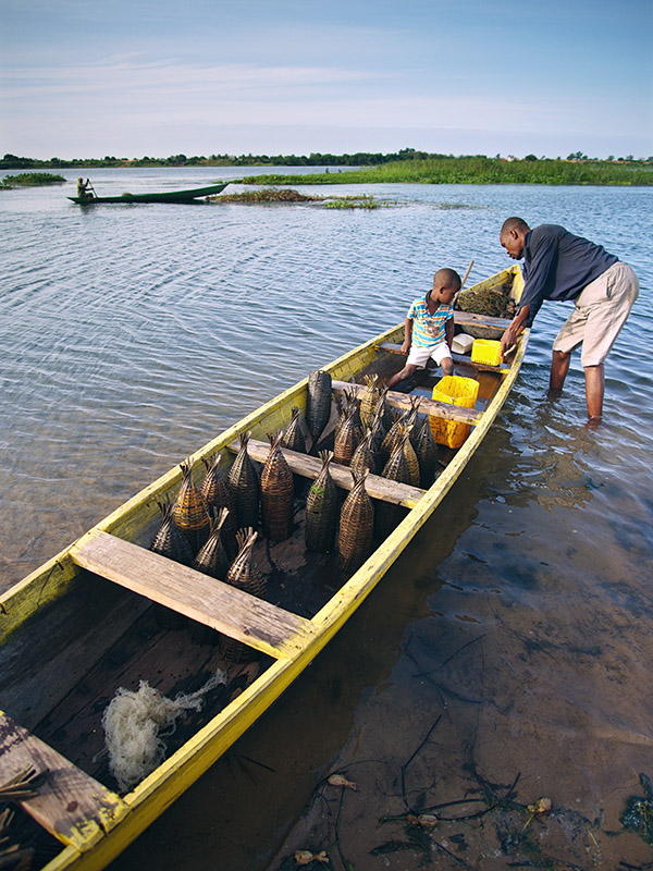 Atsiekpoe, Ghana: shrimpers heading out at dawn in the Volta Region.